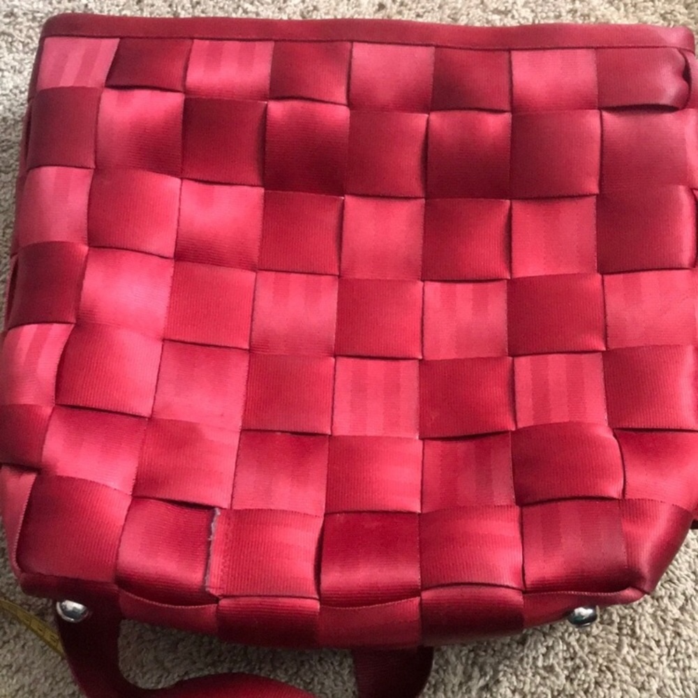 Harvey’s Red Seatbelt Backpack Purse.